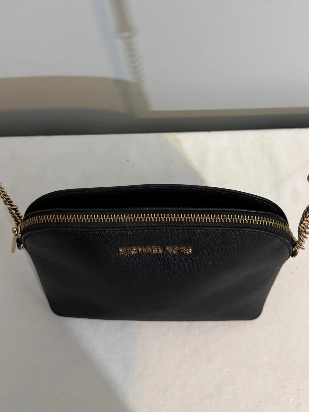 Michael Kors Black Saffiano Leather Dome Crossbody with Gold Hardware